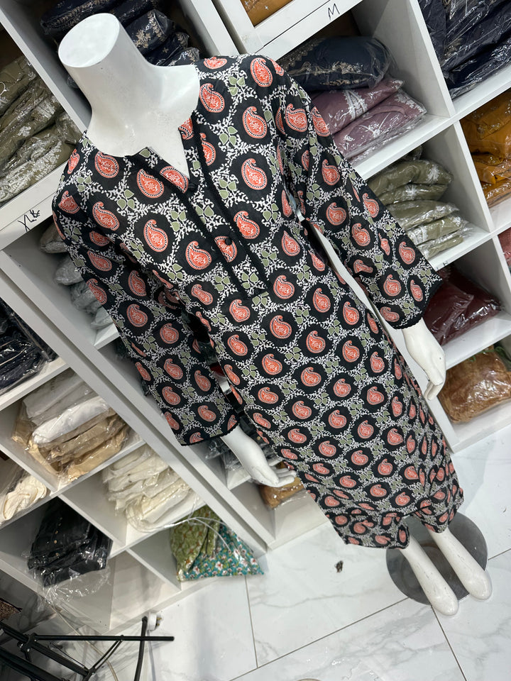 Two piece lawn material suits on offer
