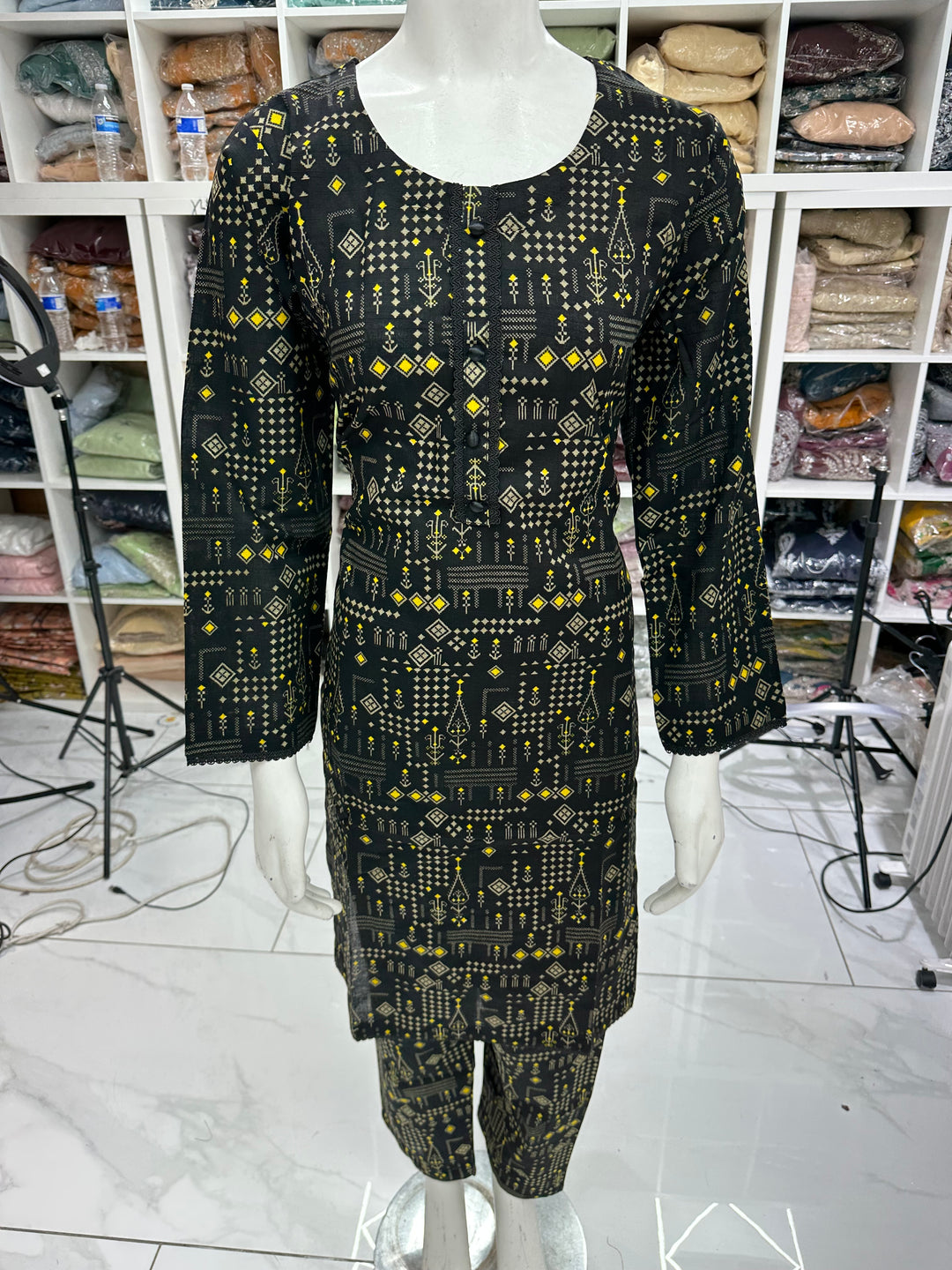 Two piece khadar material suits on offer