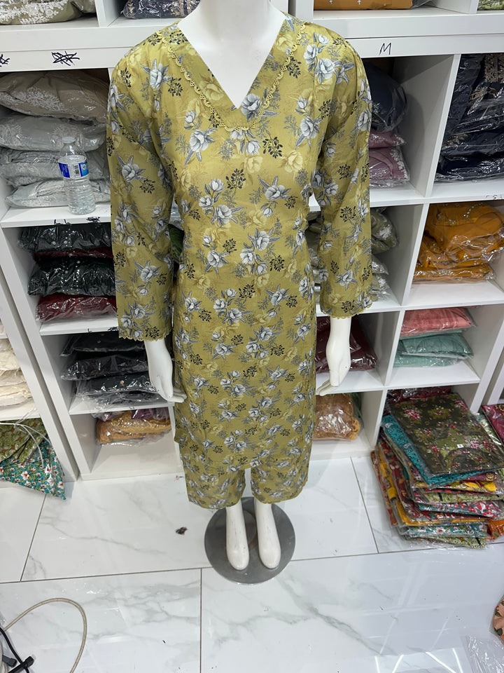 Two piece lawn material suits on offer