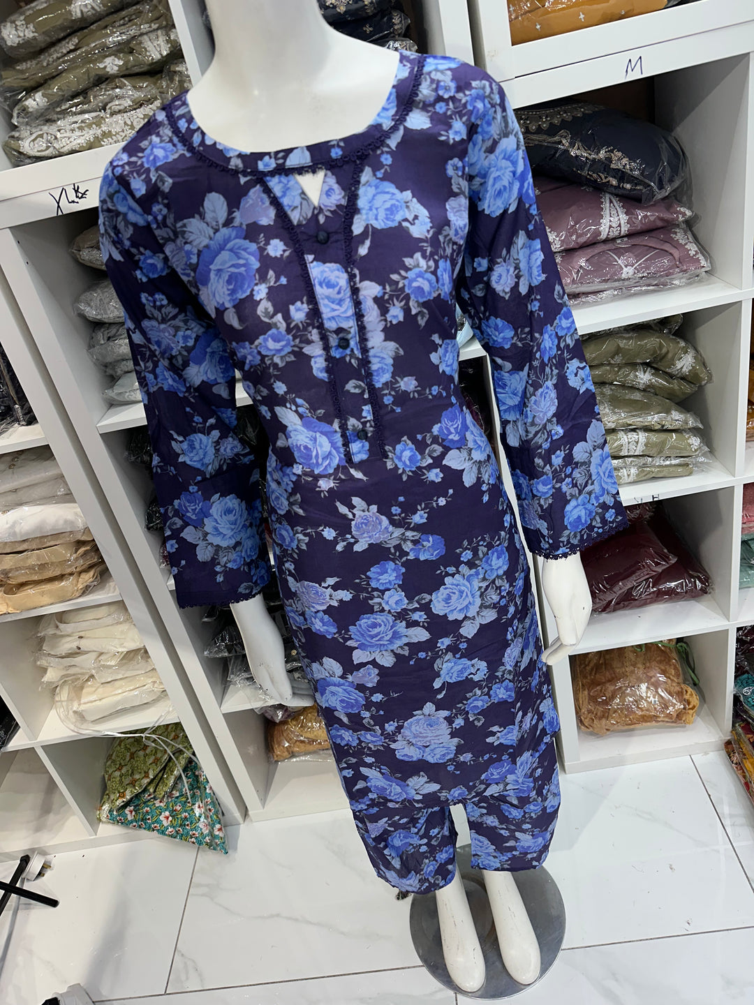 Two piece lawn material suits on offer