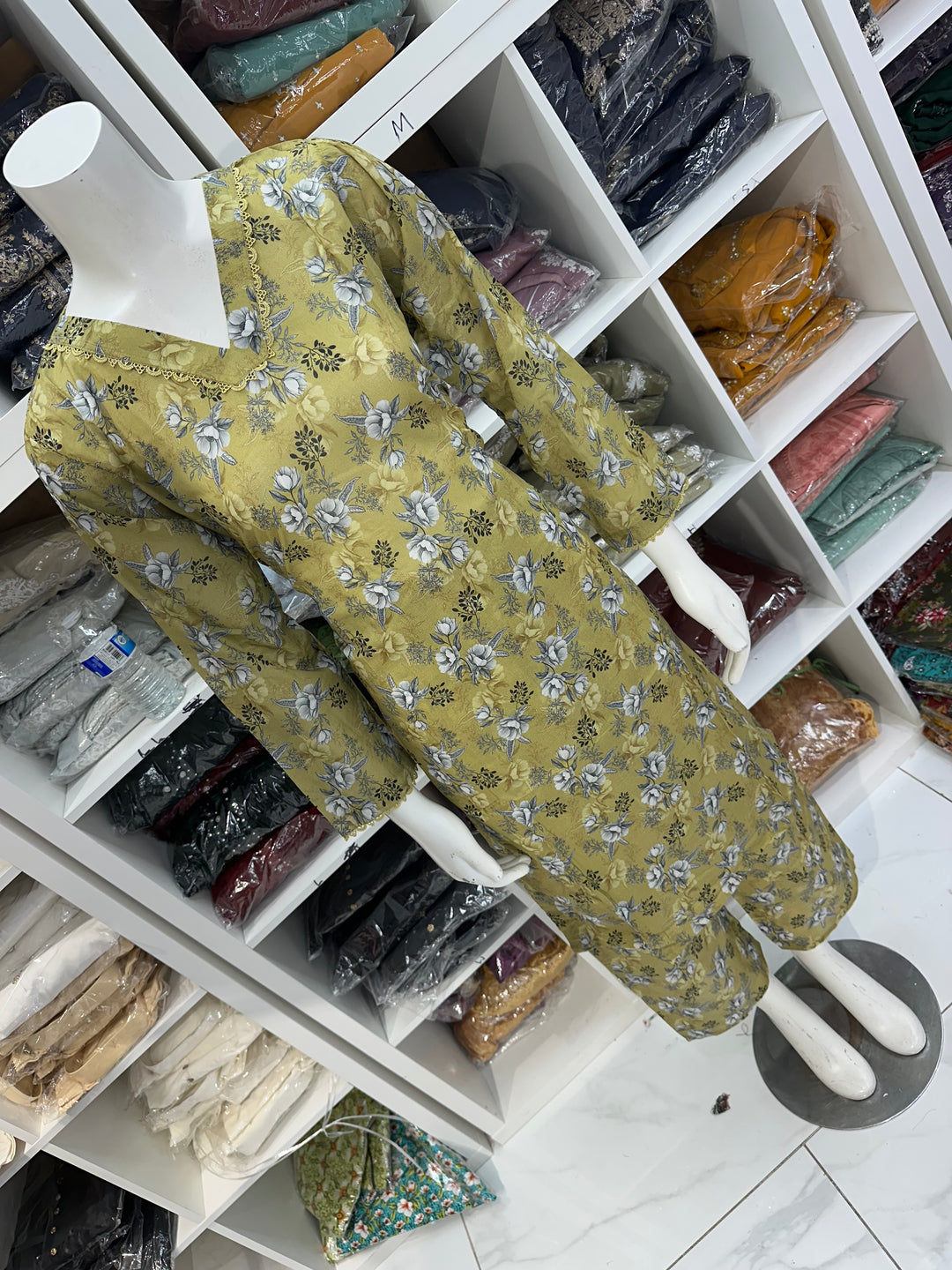 Two piece lawn material suits on offer