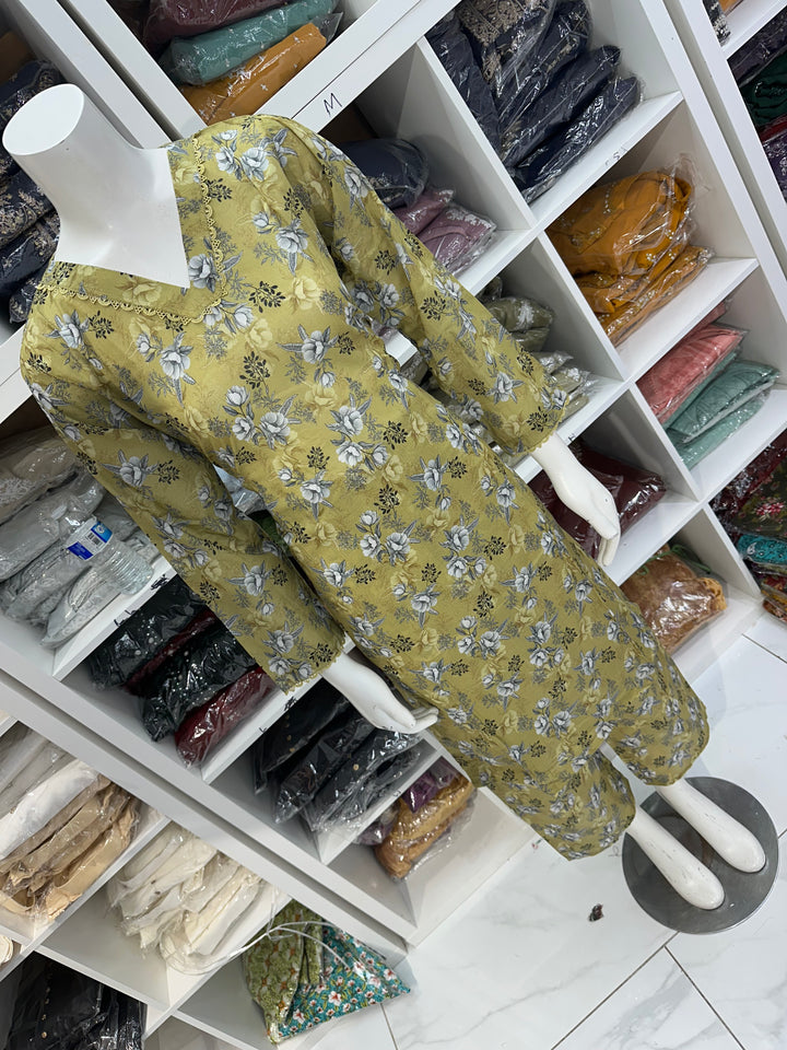 Two piece lawn material suits on offer