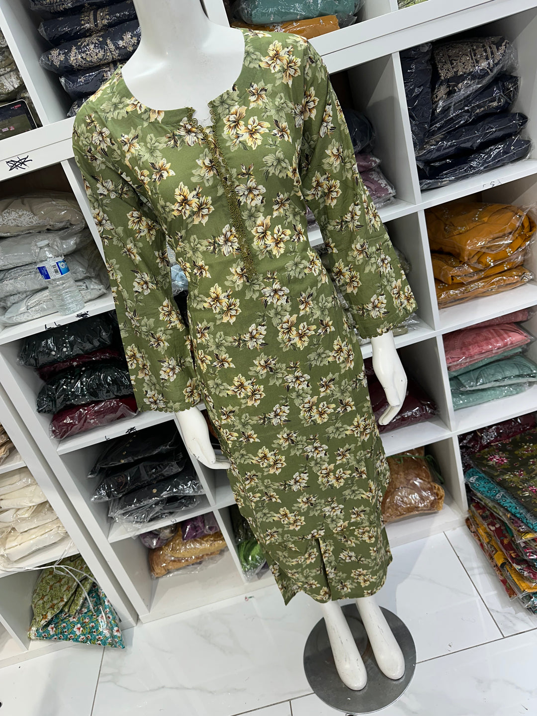 Two piece lawn material suits on offer
