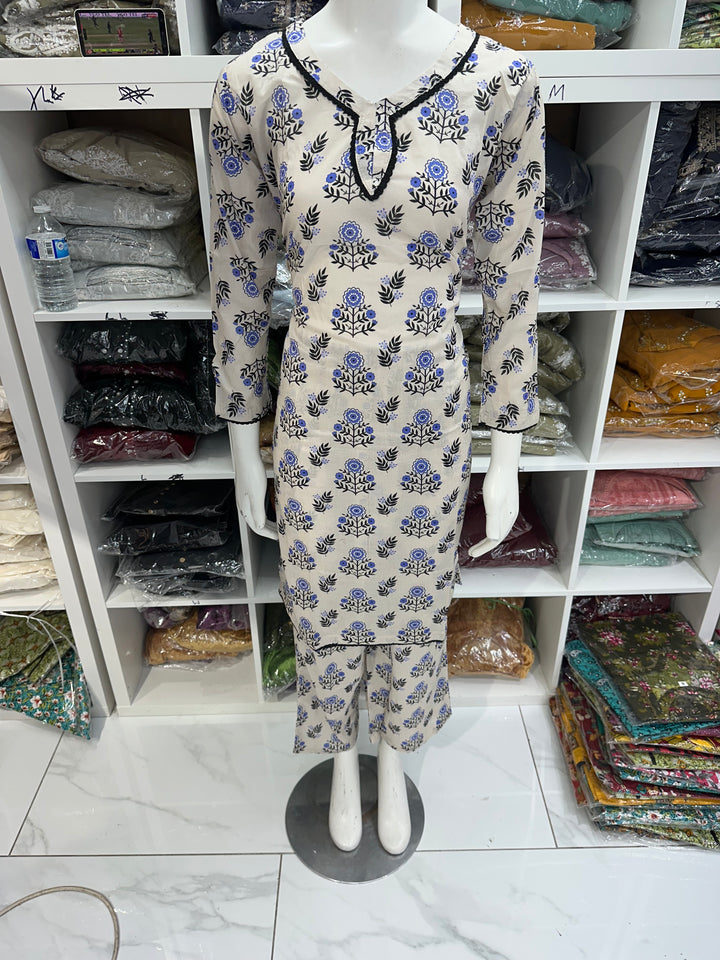 Two piece lawn material suits on offer