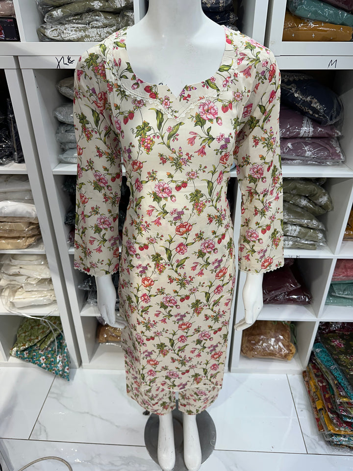 Two piece lawn material suits on offer
