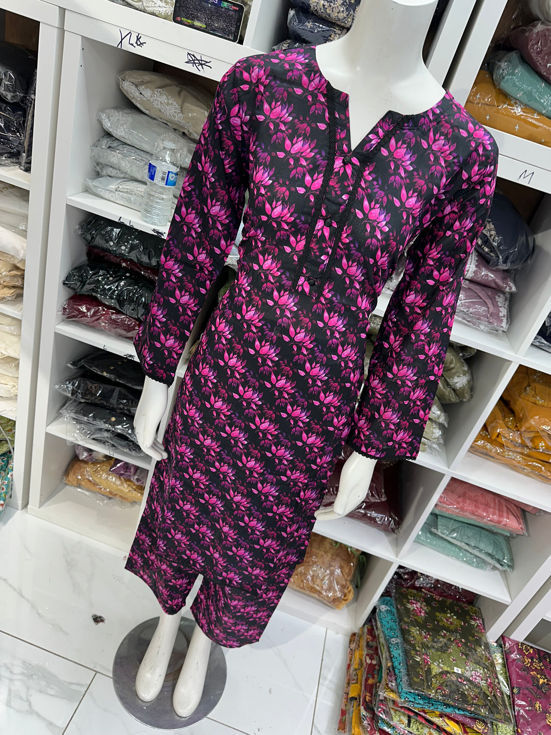 Two piece lawn material suits on offer