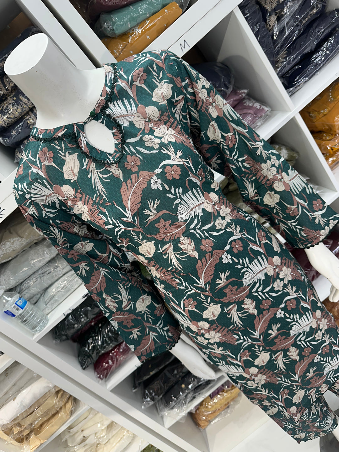 Two piece lawn material suits on offer