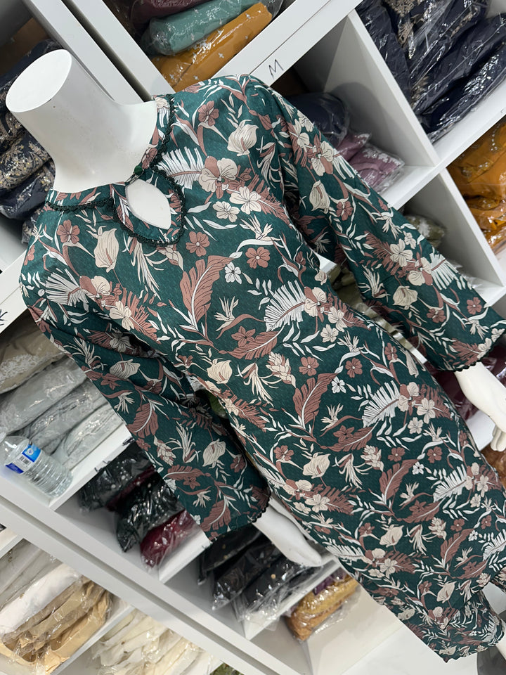 Two piece lawn material suits on offer
