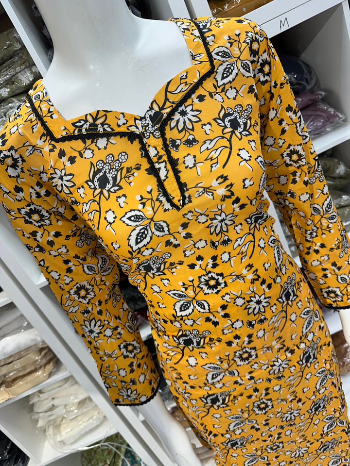 Two piece lawn material suits on offer