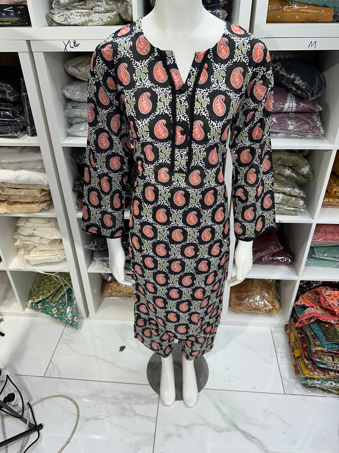Two piece lawn material suits on offer