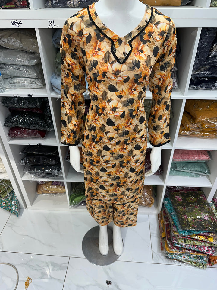 Two piece lawn material suits on offer