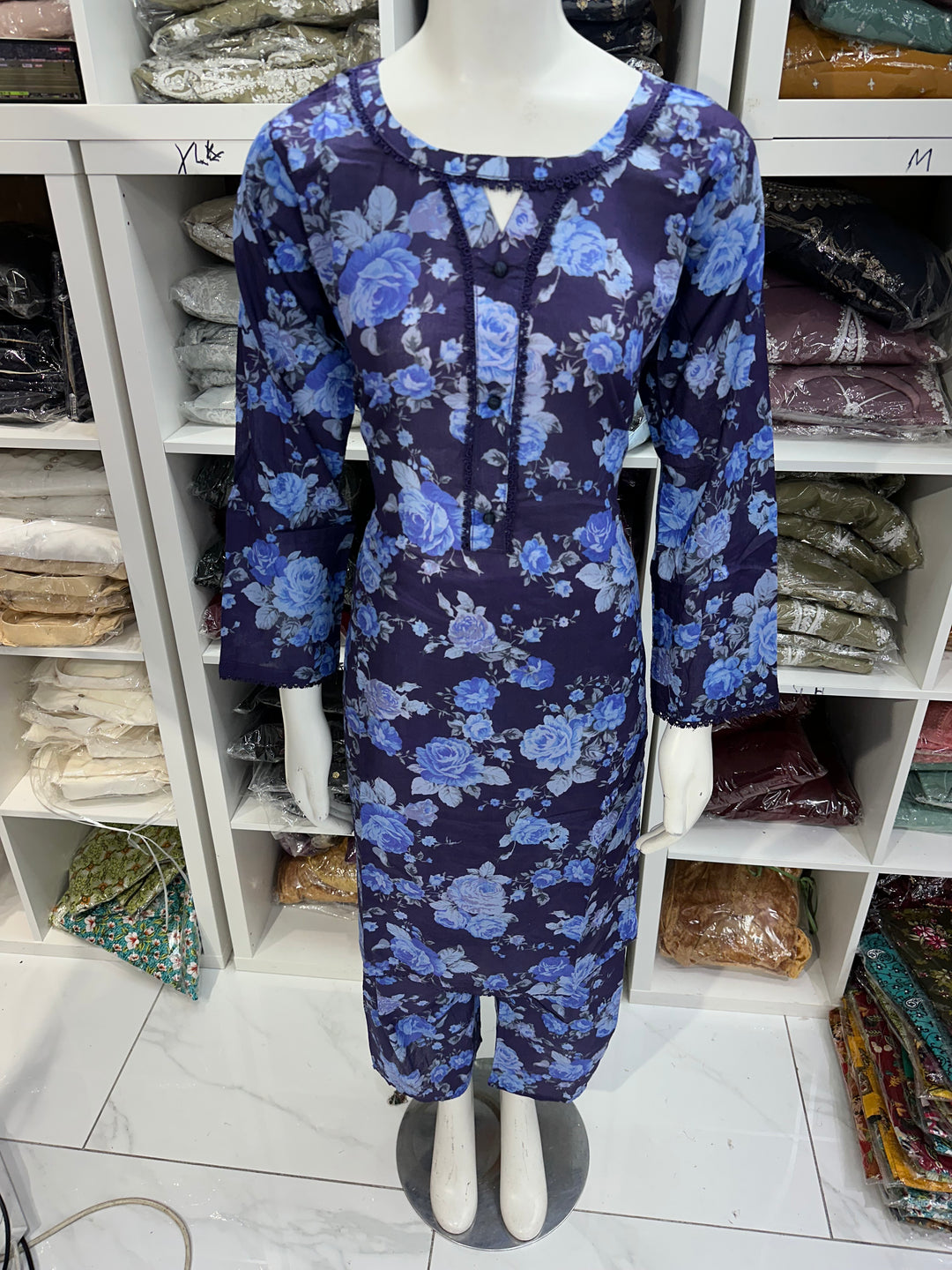 Two piece lawn material suits on offer