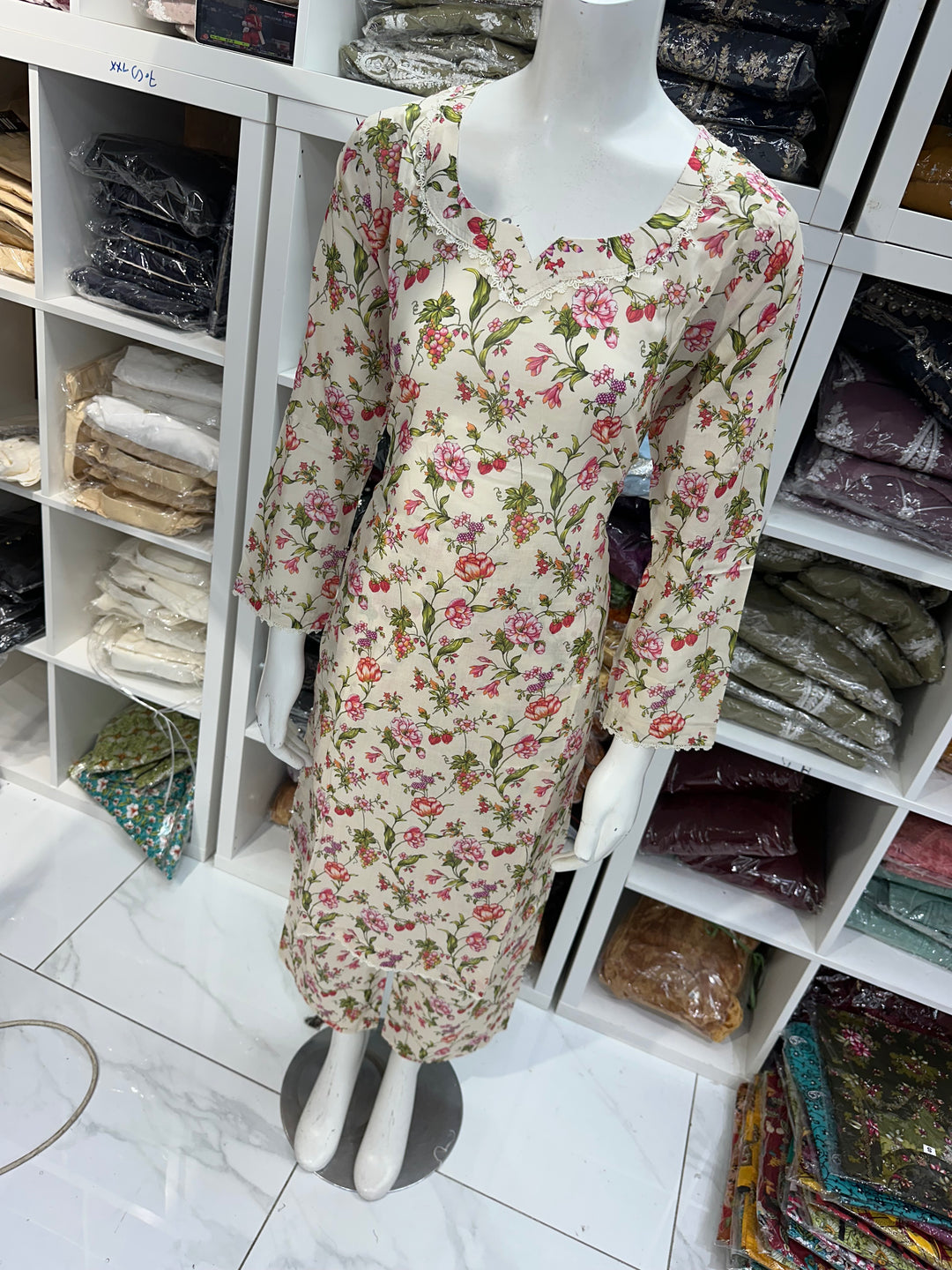 Two piece lawn material suits on offer