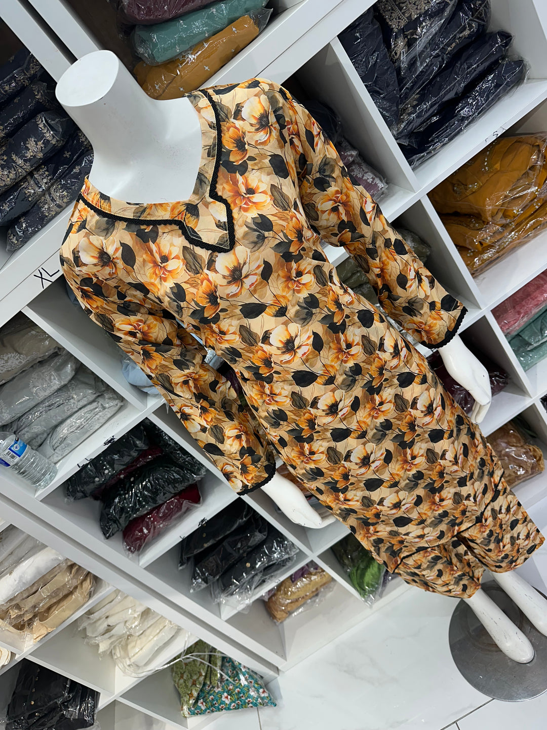 Two piece lawn material suits on offer
