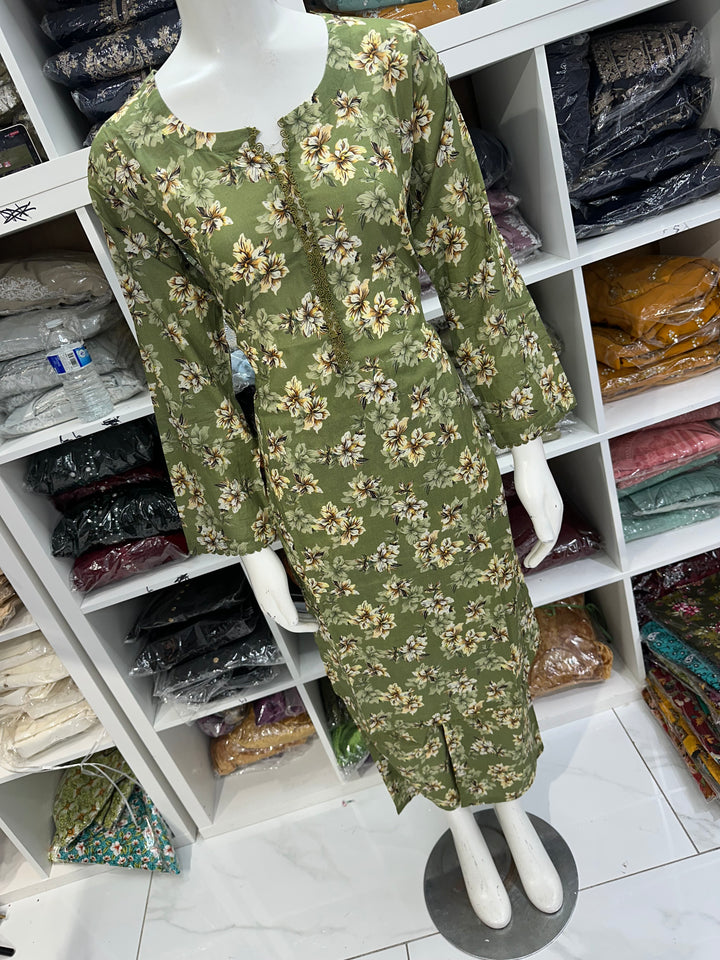 Two piece lawn material suits on offer