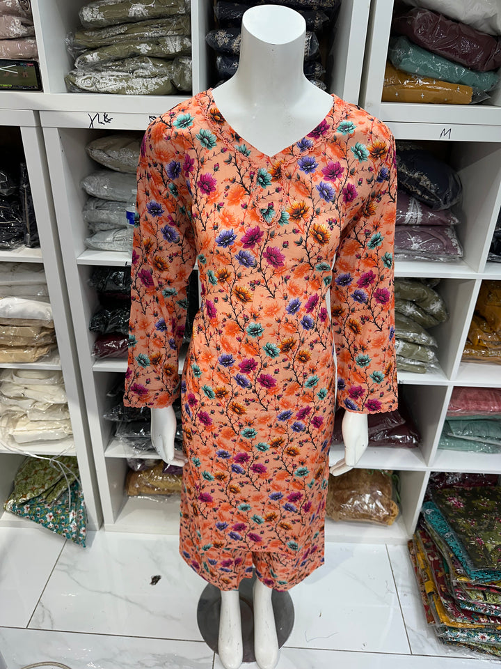Two piece lawn material suits on offer