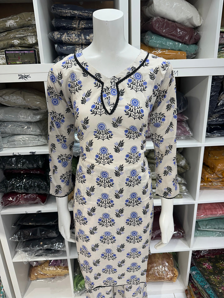 Two piece lawn material suits on offer