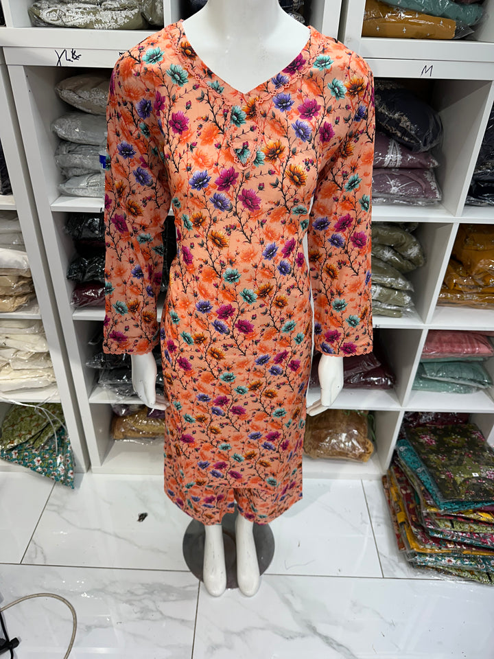 Two piece lawn material suits on offer