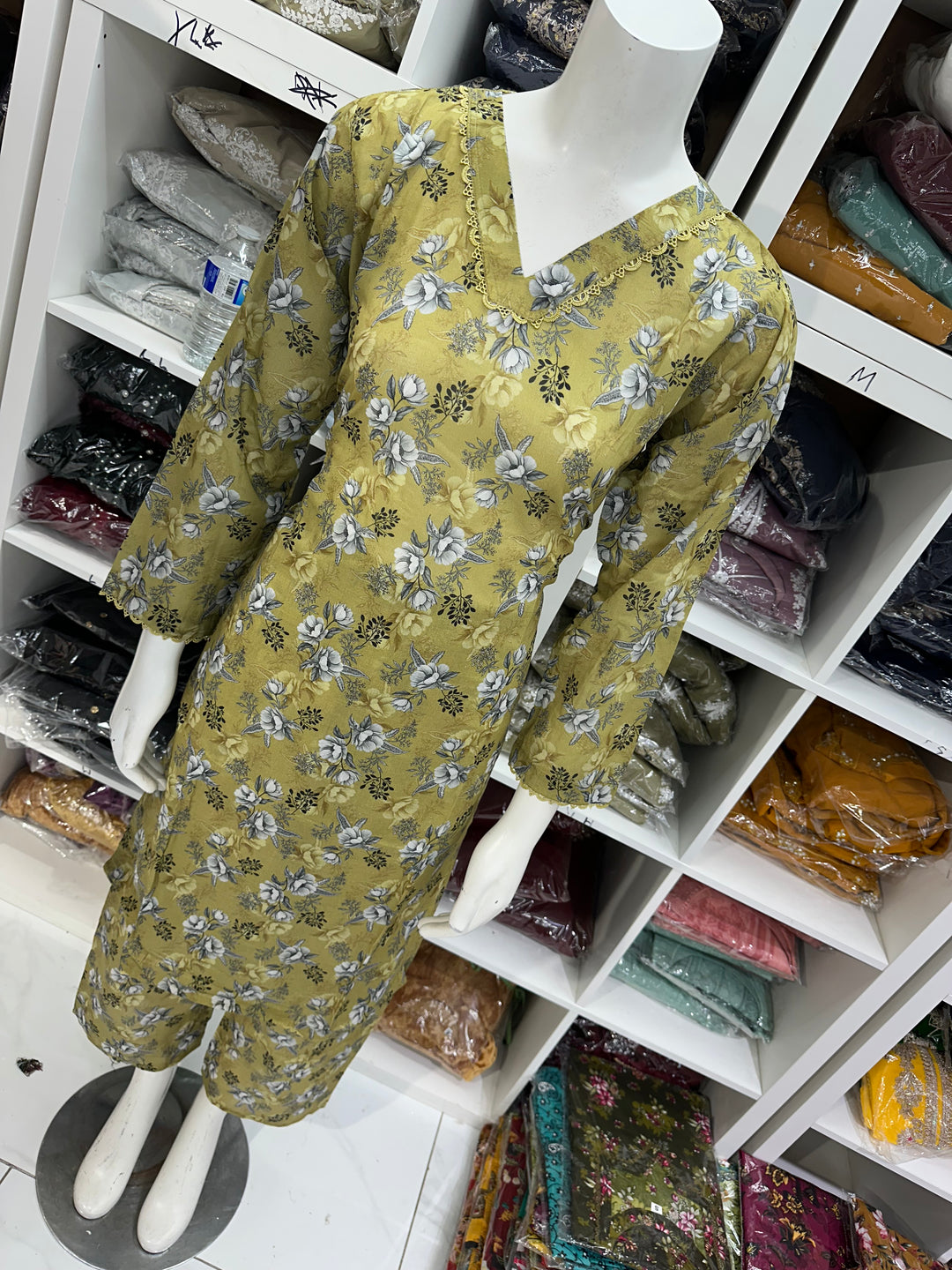 Two piece lawn material suits on offer