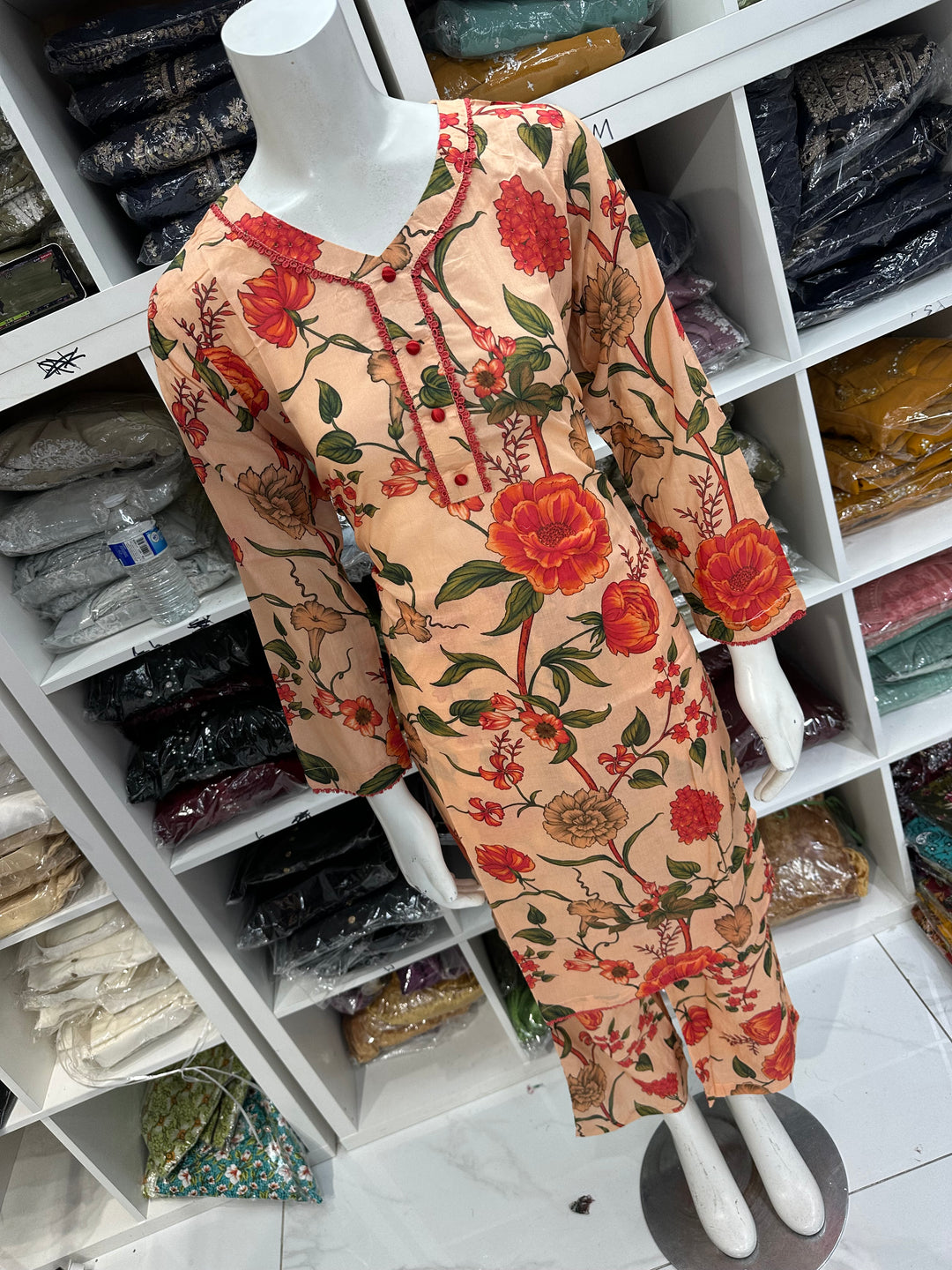 Two piece lawn material suits on offer