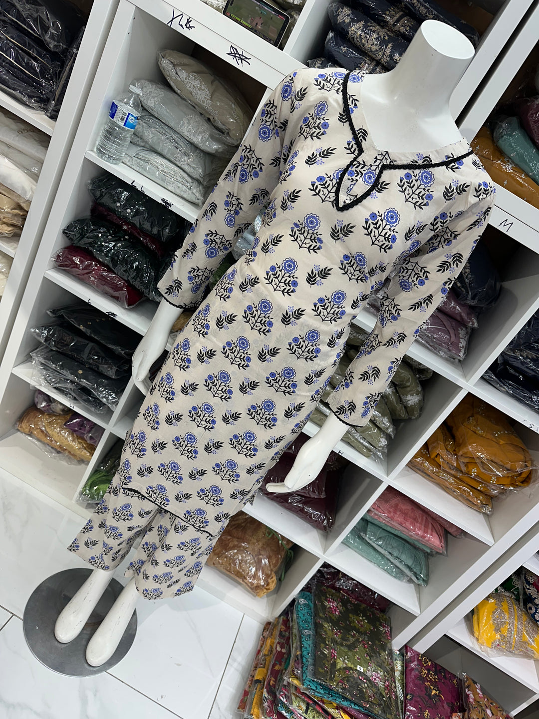 Two piece lawn material suits on offer