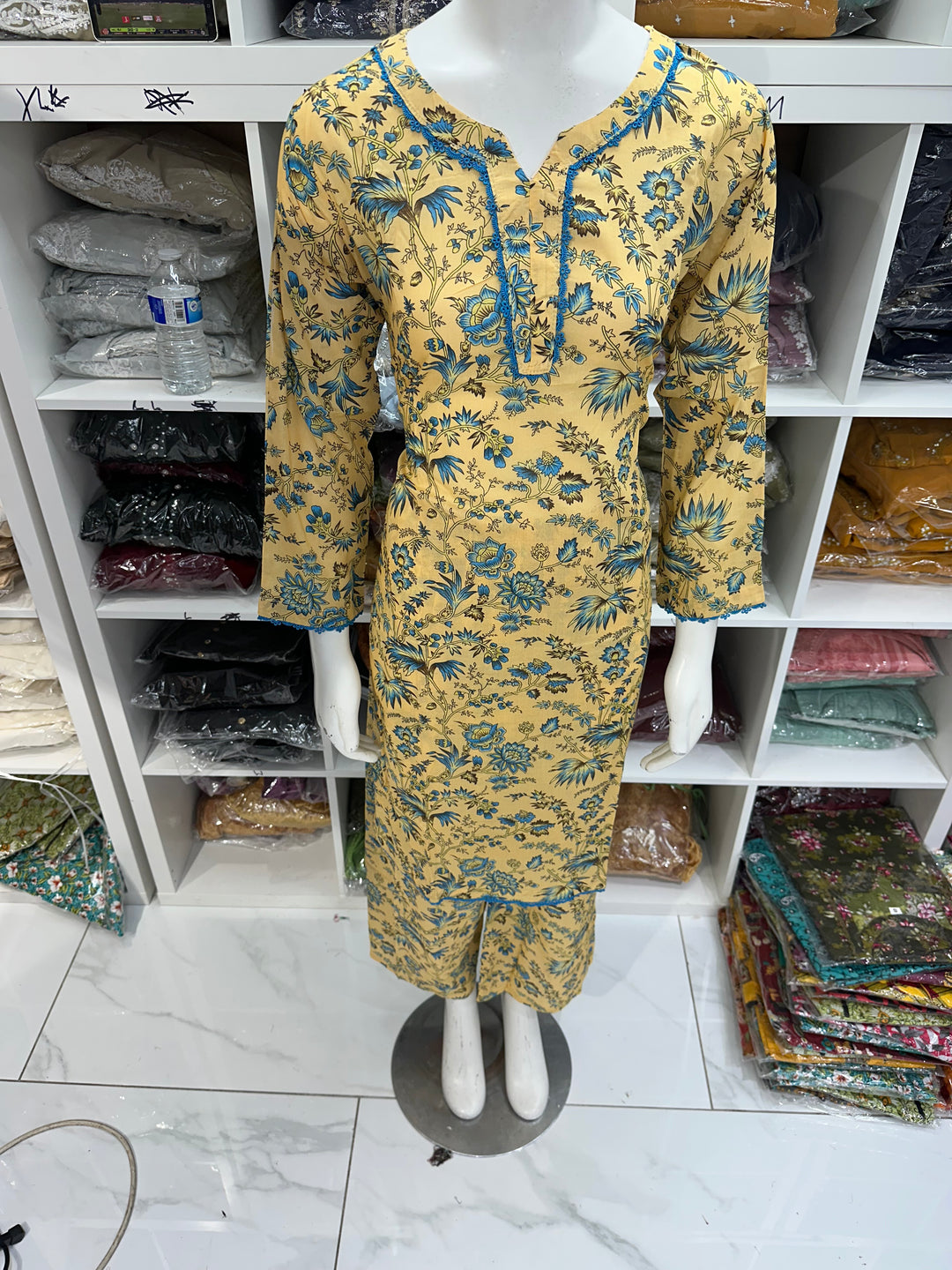 Two piece lawn material suits on offer