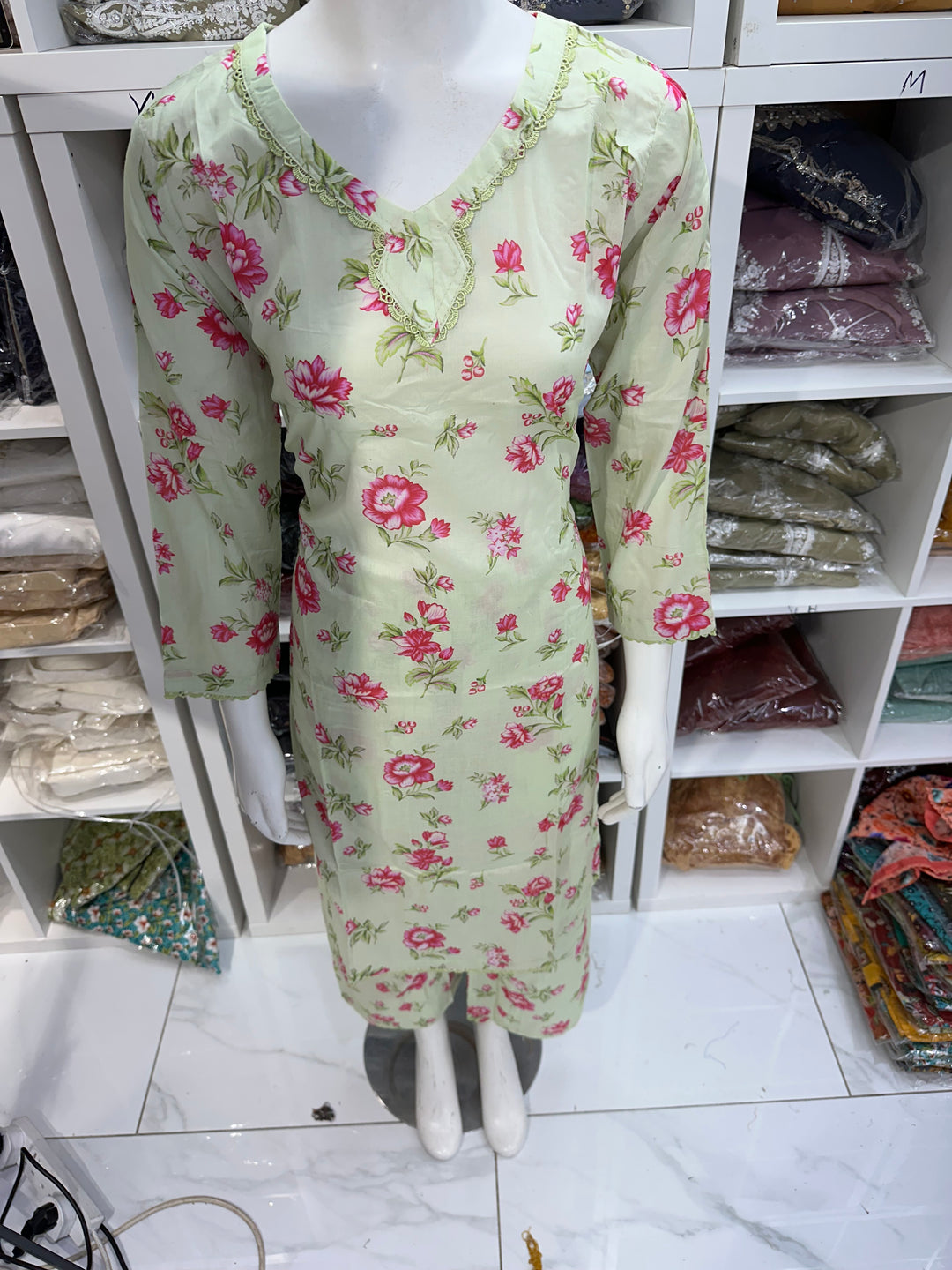 Two piece lawn material suits on offer