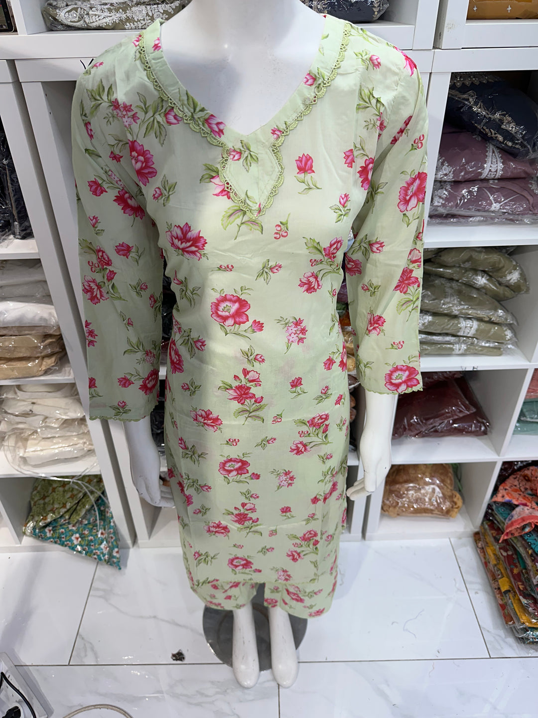 Two piece lawn material suits on offer