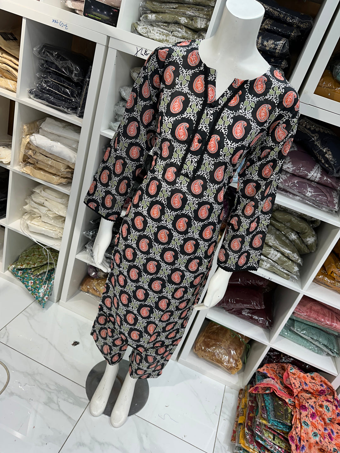 Two piece lawn material suits on offer