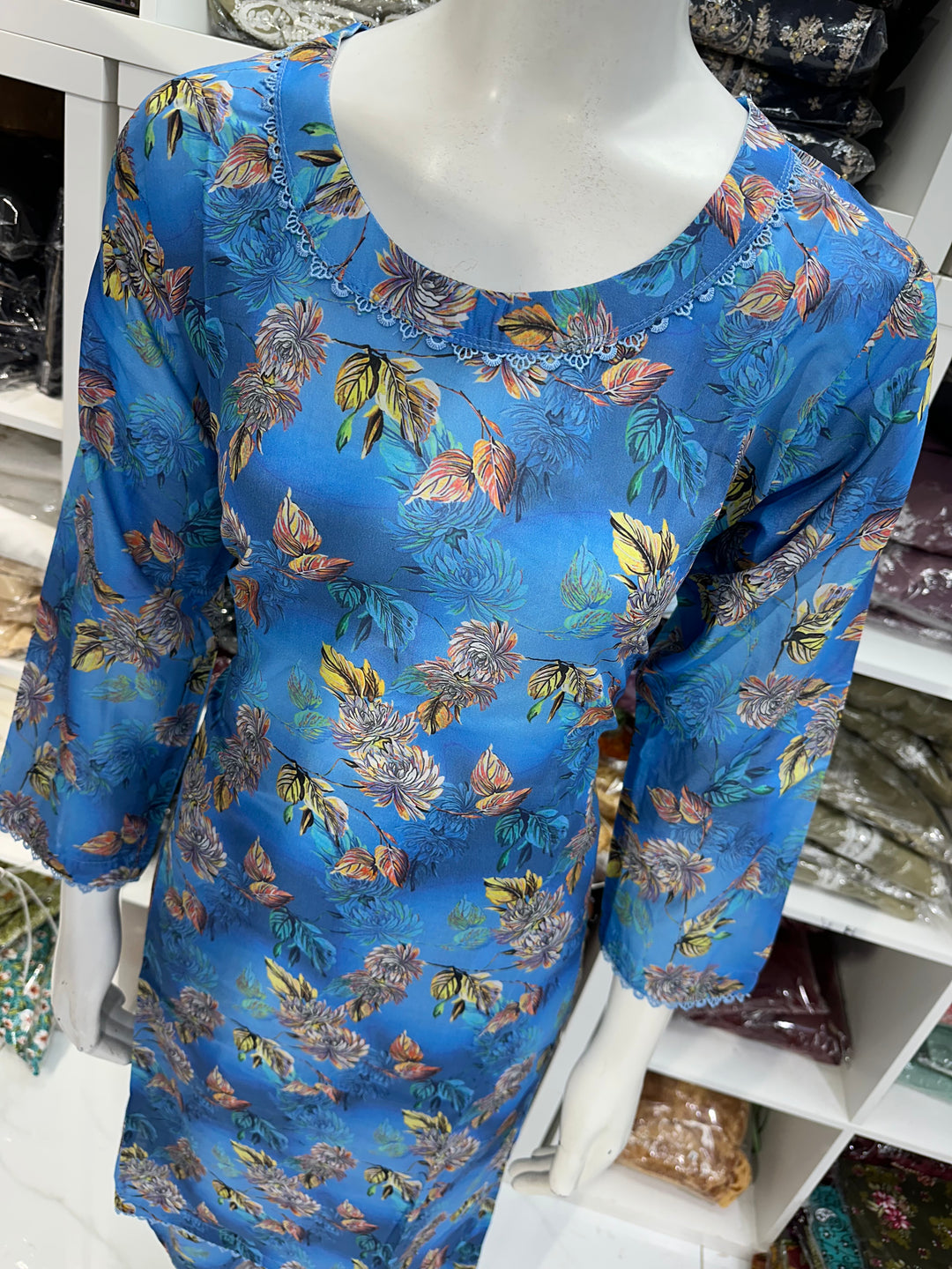 Two piece lawn material suits on offer