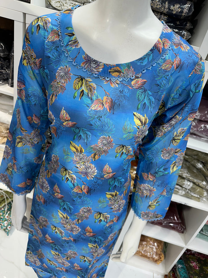 Two piece lawn material suits on offer