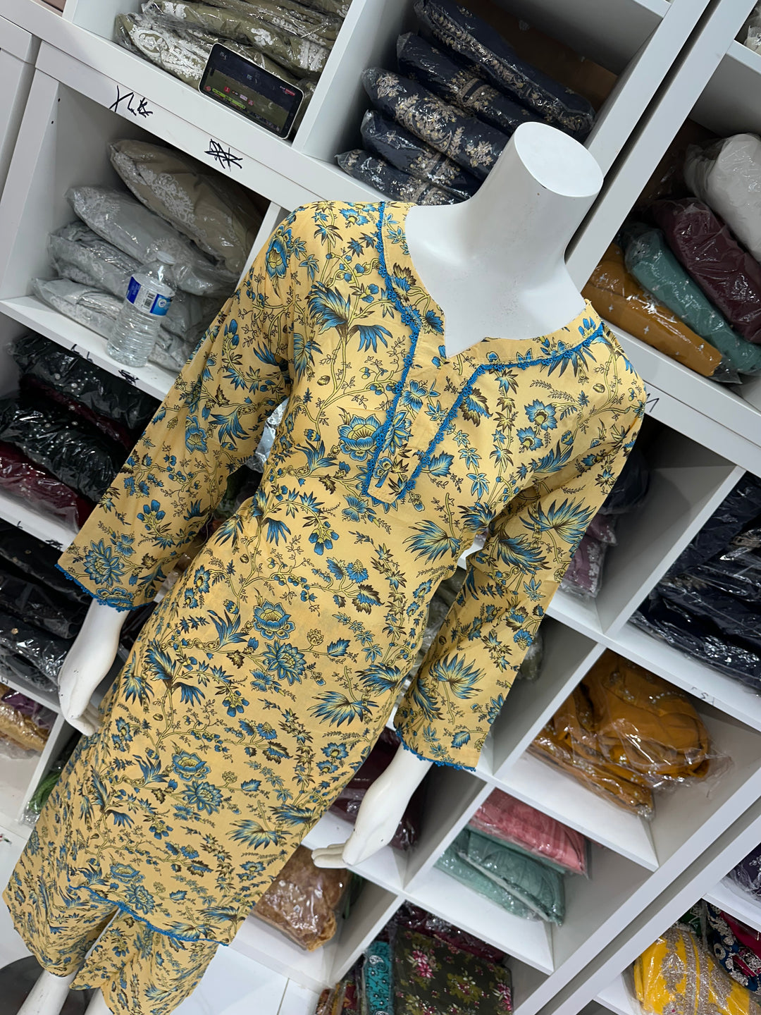 Two piece lawn material suits on offer