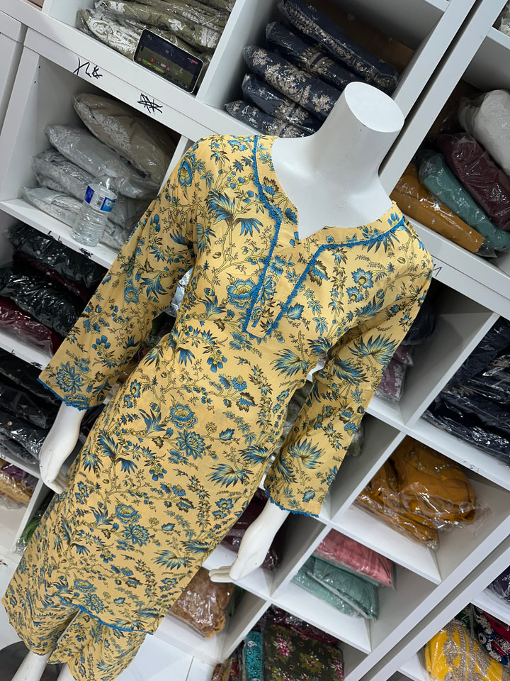 Two piece lawn material suits on offer