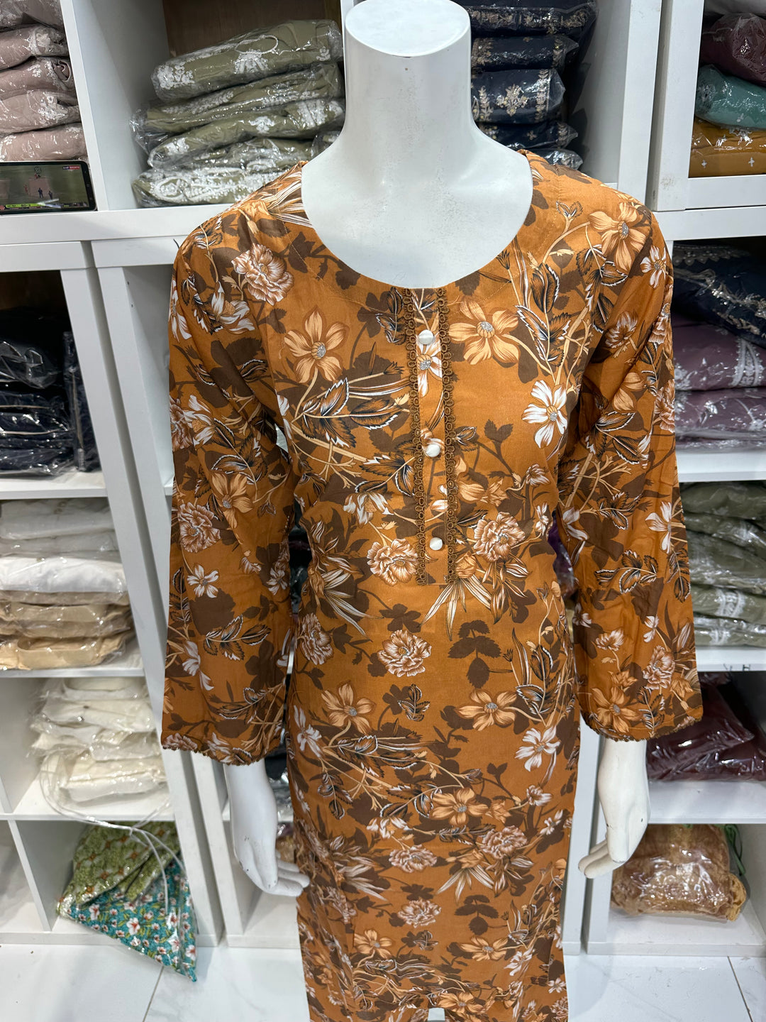 Two piece lawn material suits on offer
