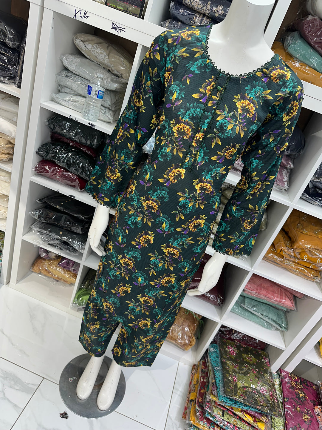 Two piece lawn material suits on offer