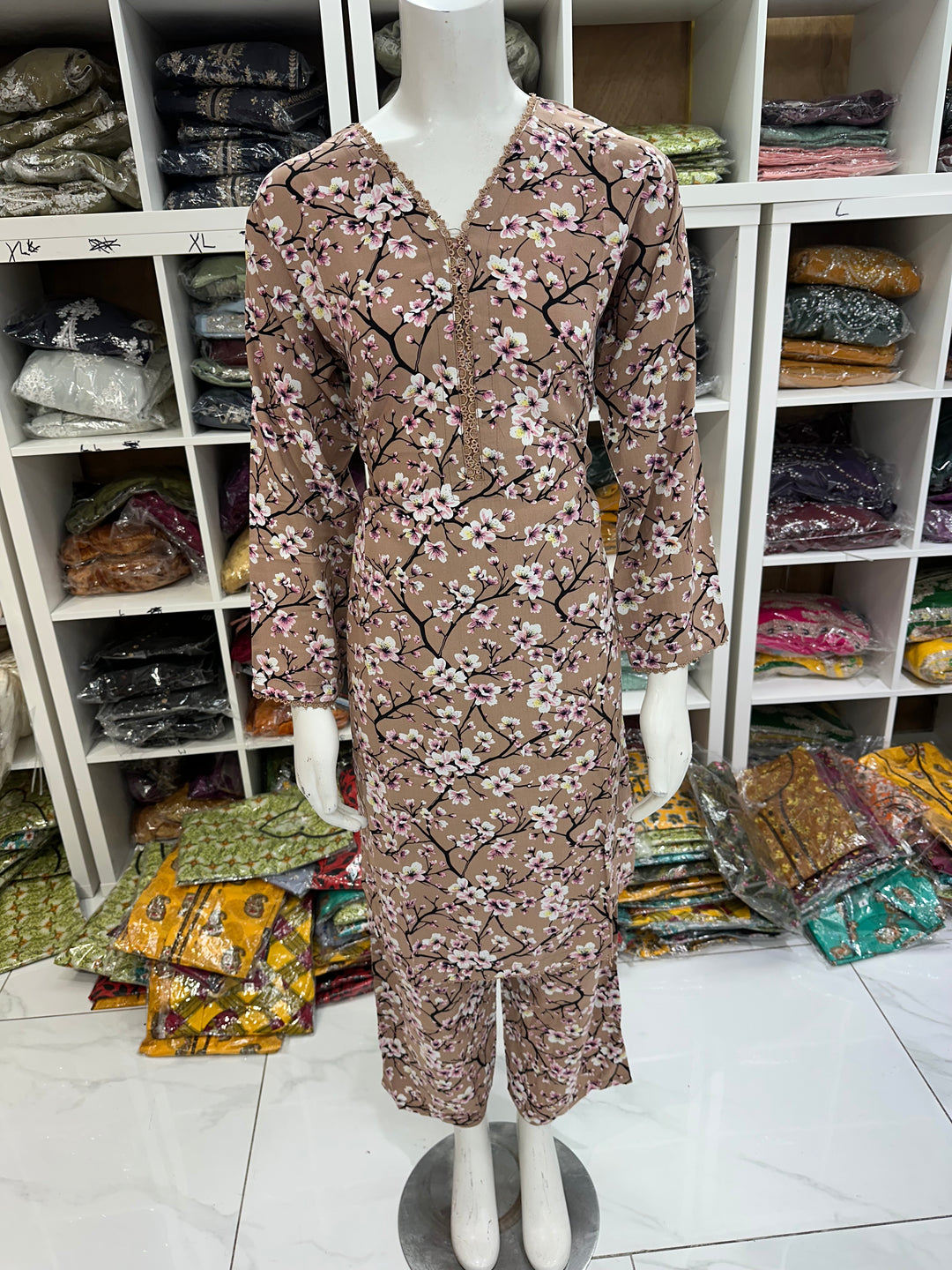 Two piece linen material suits on offer