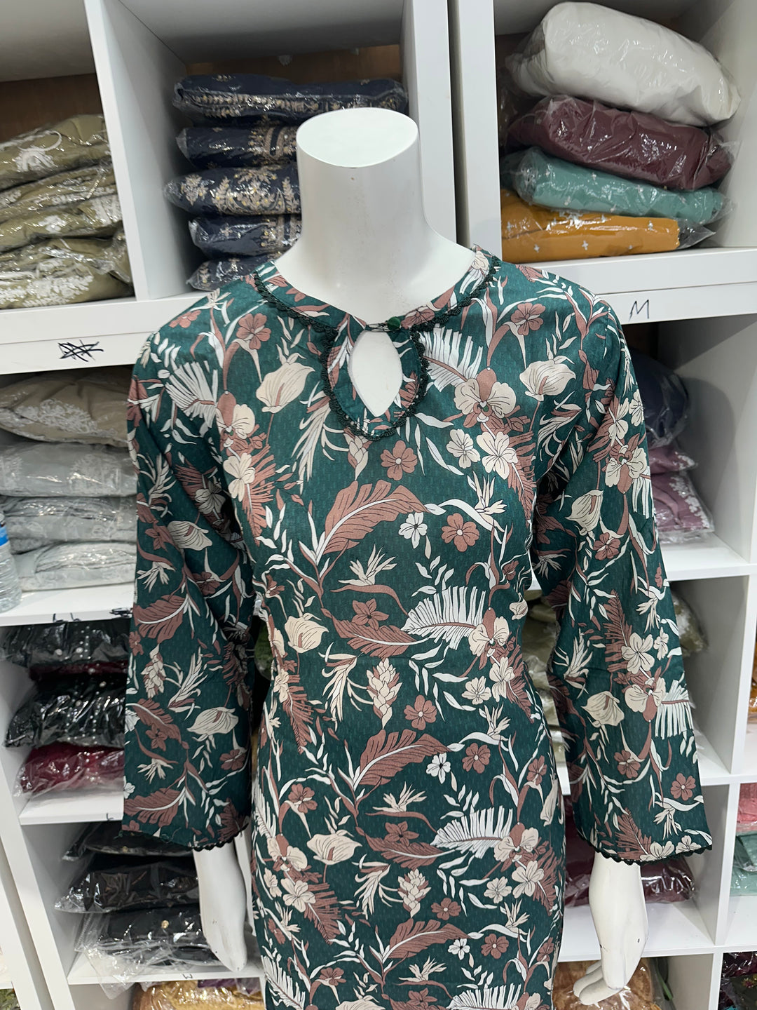 Two piece lawn material suits on offer