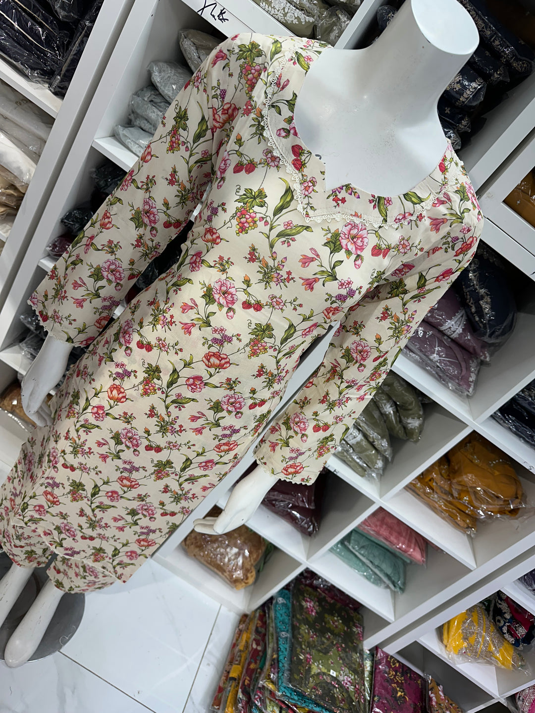 Two piece lawn material suits on offer