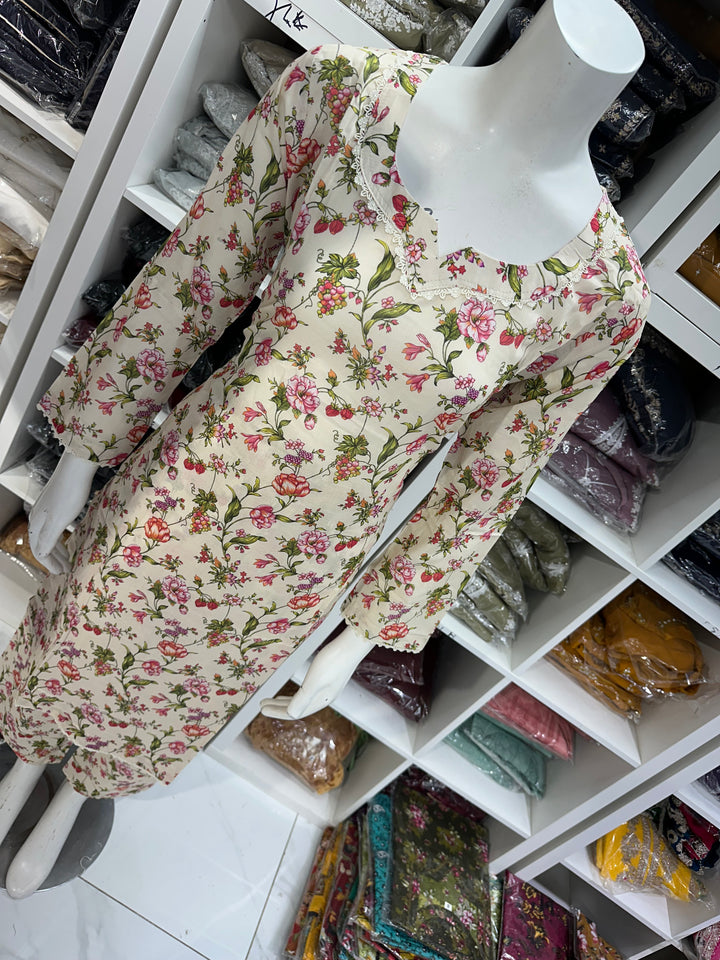 Two piece lawn material suits on offer
