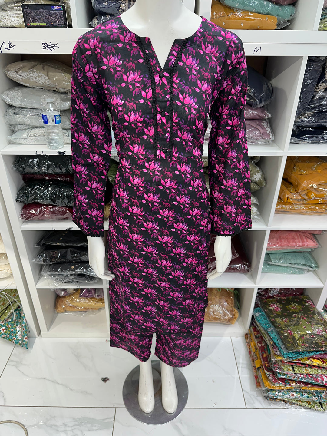 Two piece lawn material suits on offer