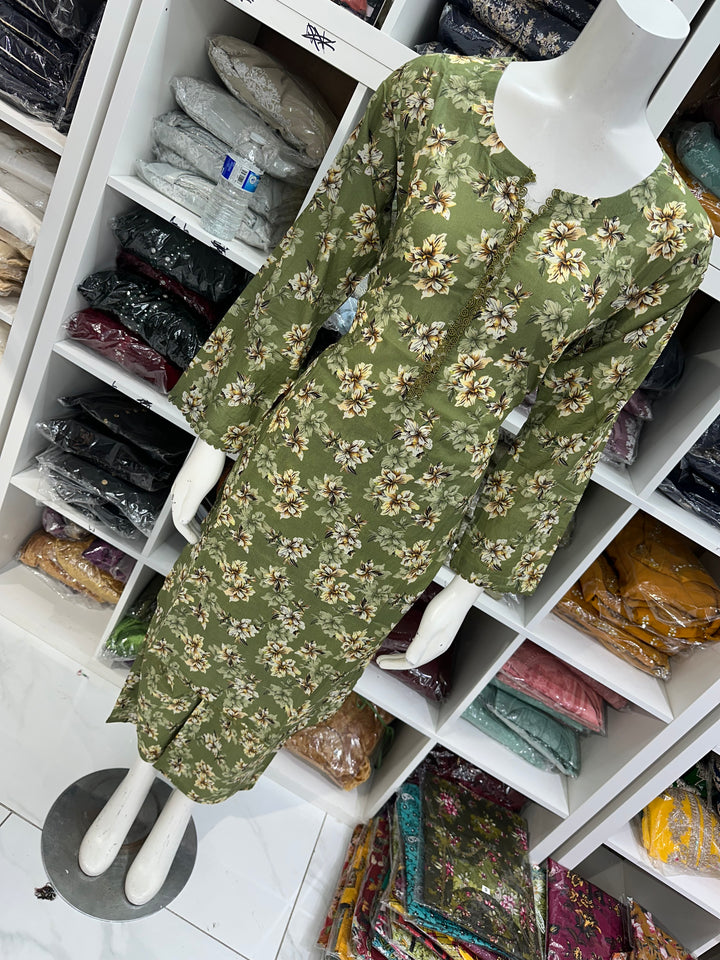 Two piece lawn material suits on offer