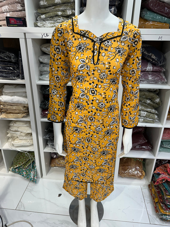 Two piece lawn material suits on offer