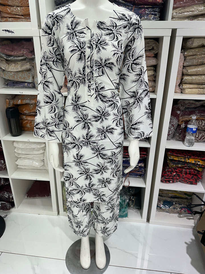 two piece linen material floral print suits on offer Ready to Wear