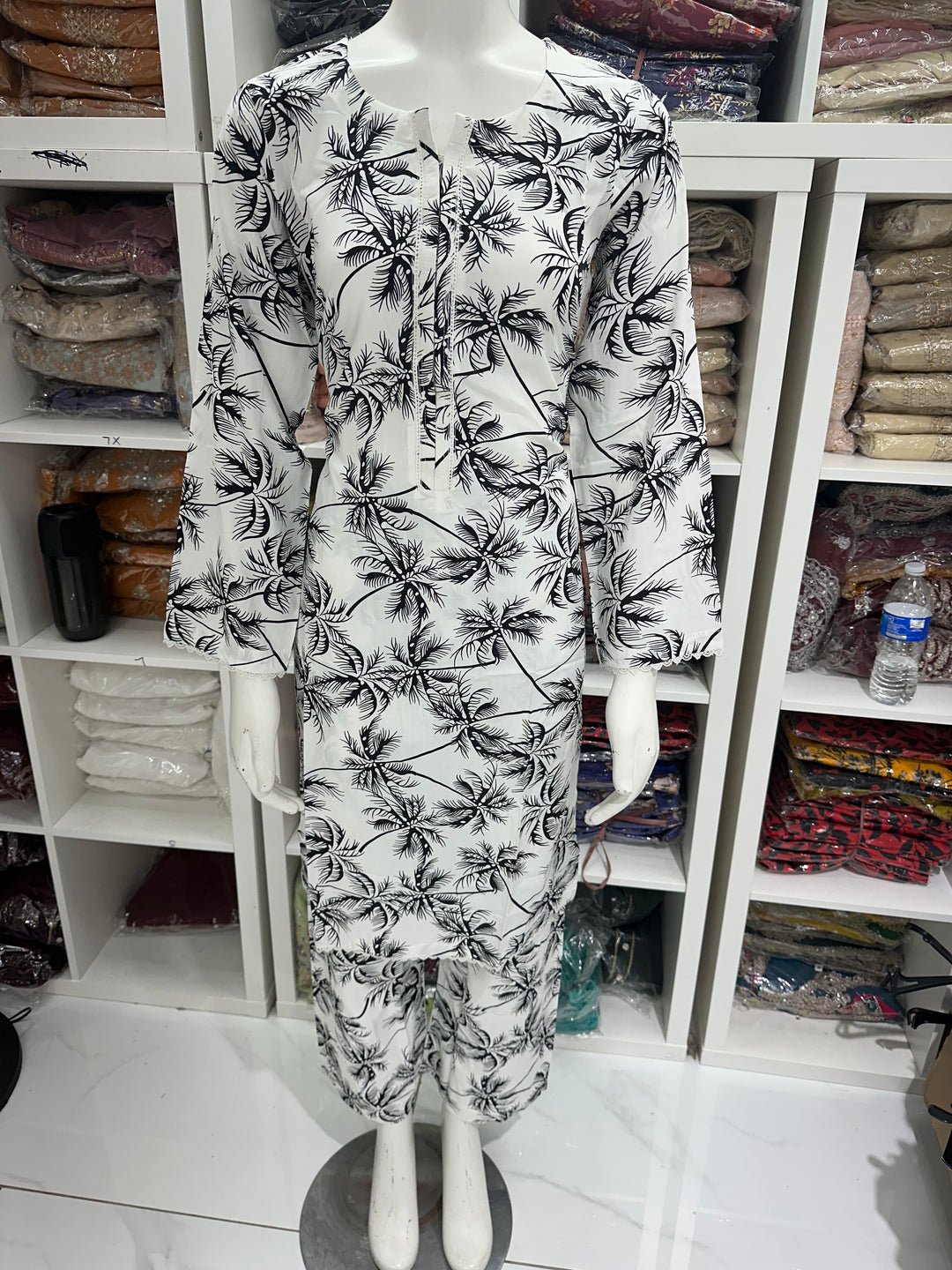two piece linen material floral print suits on offer Ready to Wear
