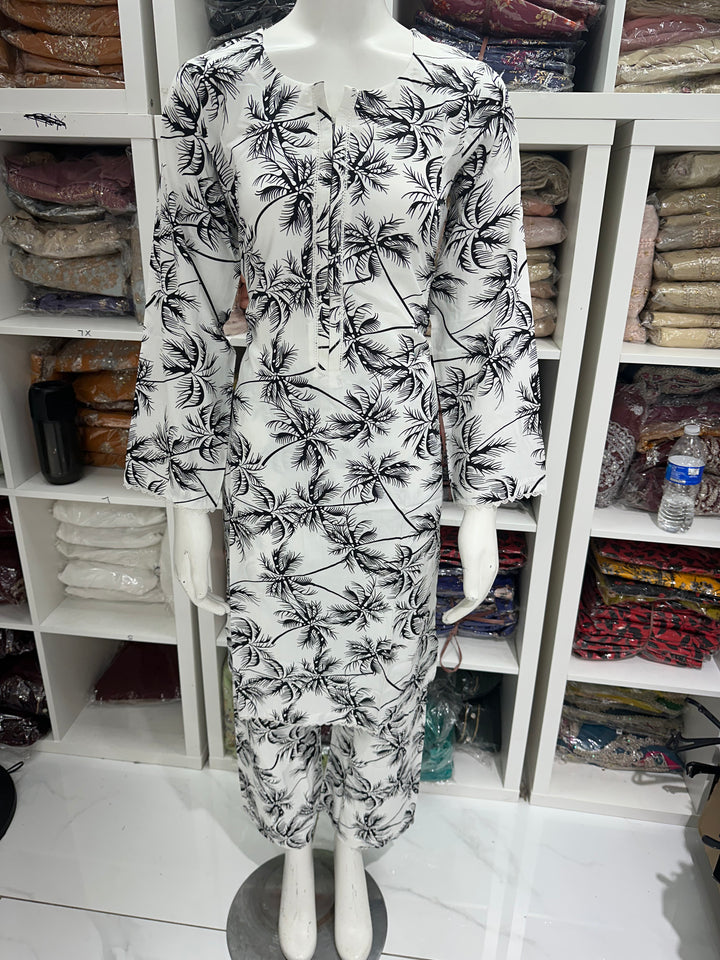 two piece linen material floral print suits on offer Ready to Wear