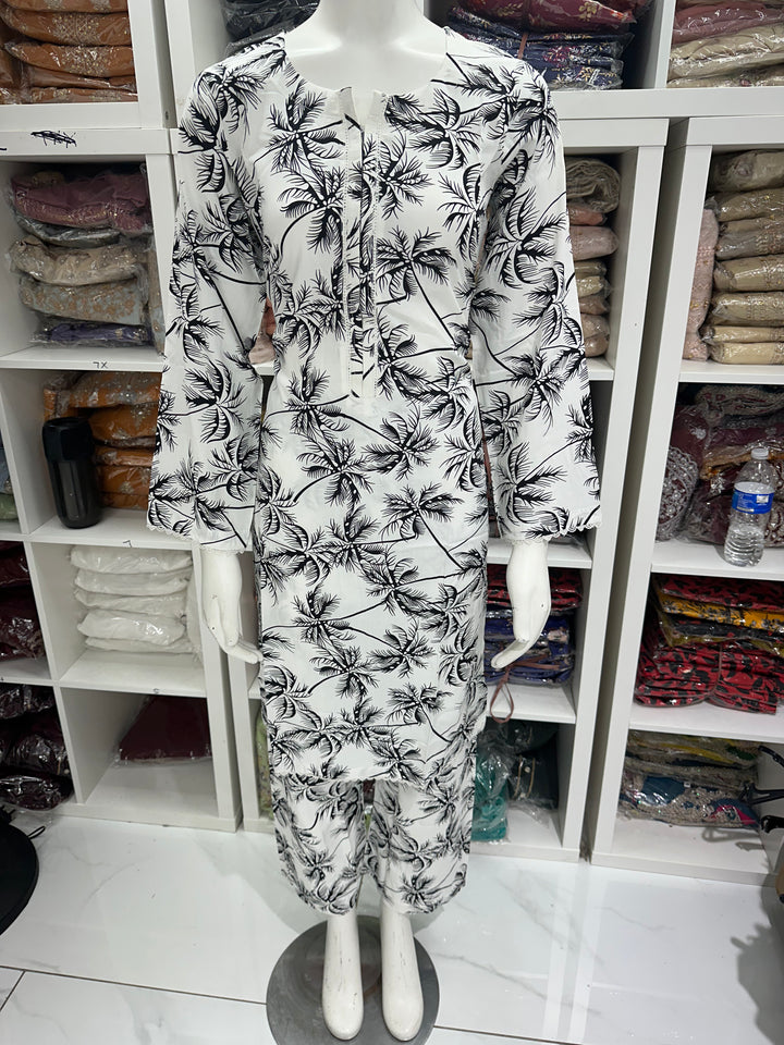 two piece linen material floral print suits on offer Ready to Wear