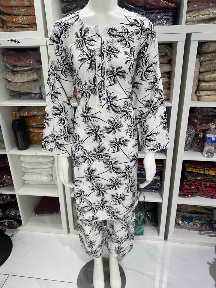 two piece linen material floral print suits on offer Ready to Wear