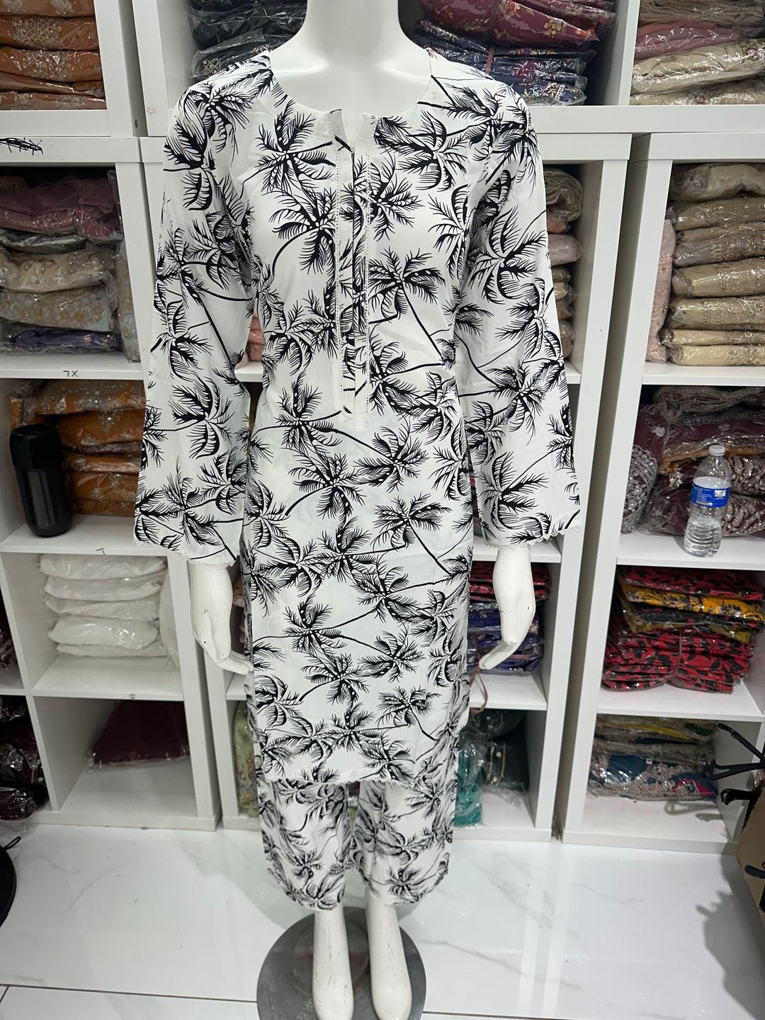 two piece linen material floral print suits on offer Ready to Wear
