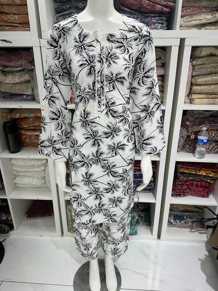 two piece linen material floral print suits on offer Ready to Wear