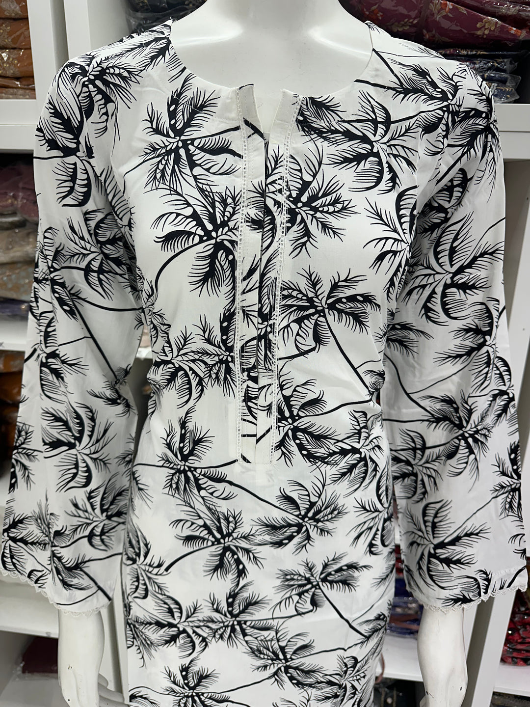 two piece linen material floral print suits on offer Ready to Wear